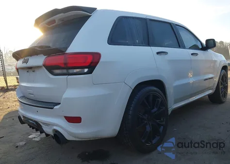 2015 Jeep Grand Cherokee High Altitude z USA, uszkodzony, nr VIN 1C4RJFCG9FC110858